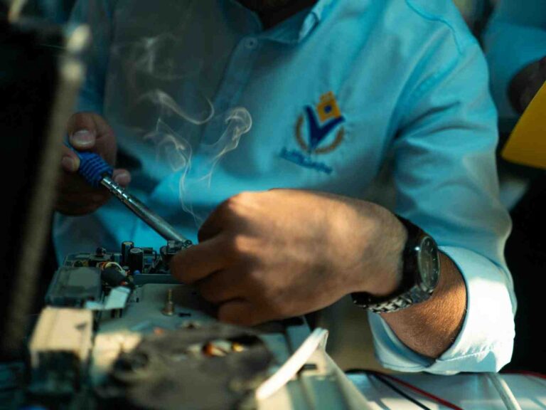 FEATURED_o-of-close-up-of-technician-soldering-electro