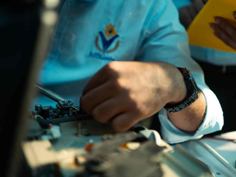 FEATURED_o-of-close-up-of-technician-working-on-machi