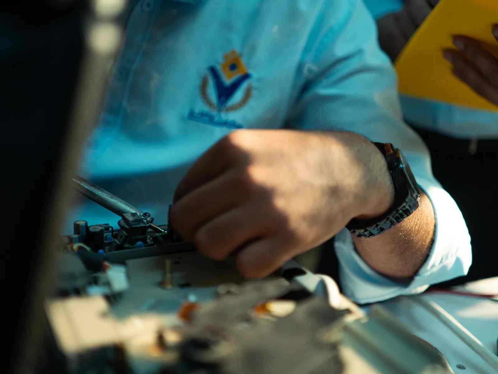 FEATURED_o-of-close-up-of-technician-working-on-machi
