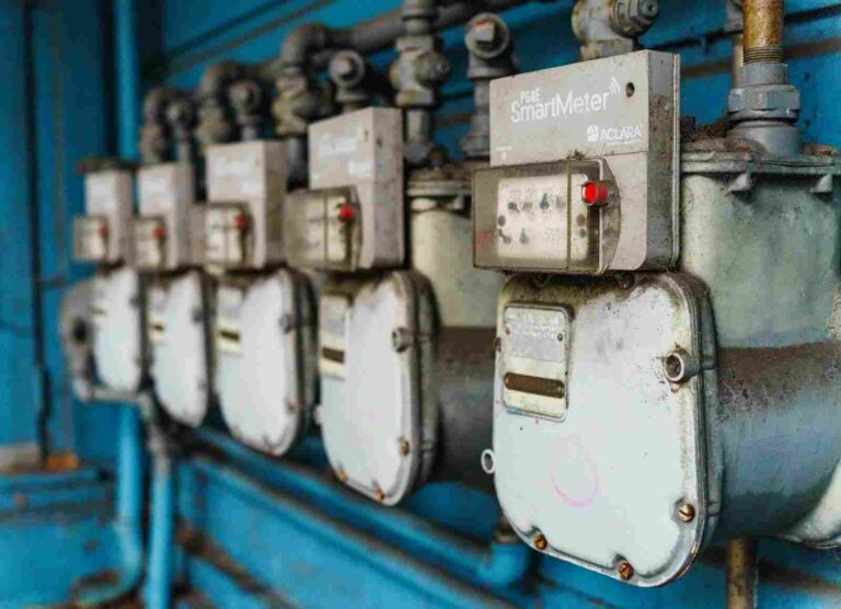 FEATURED_o-of-row-of-industrial-utility-meters-on-blue-