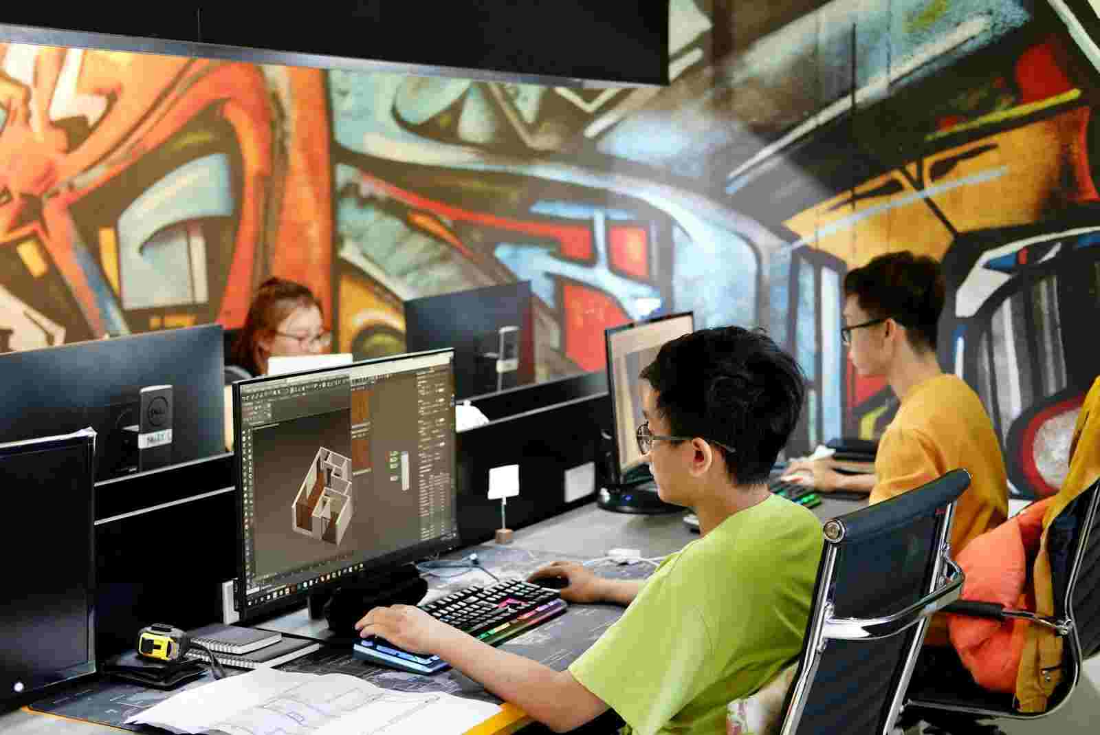 FEATURED_o-of-young-people-sitting-and-working-on-compu